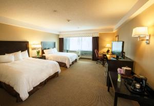 Postel nebo postele na pokoji v ubytování Hampton Inn & Suites Boston Crosstown Center