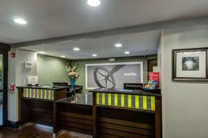 a restaurant with a smiley sign on the wall at Hampton Inn Bowie in Bowie