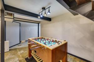 a room with a foos ball on a table at Eureka Springs Rental Cabin 8 Mi to Downtown! in Eureka Springs