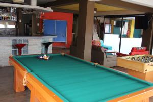 Biliardo stalas apgyvendinimo įstaigoje Cuscopackers Hostels