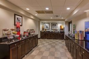 a hair salon with a row of counters at Hampton Inn Clearfield in Clearfield