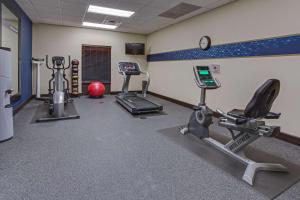 a gym with several exercise bikes and a treadmill at Hampton Inn Clearfield in Clearfield