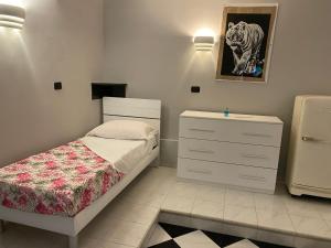 Säng eller sängar i ett rum på Silver appartament Oceania