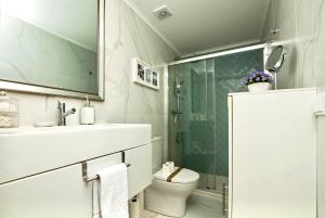 Koupelna v ubytování Apartamento Ponte 25 Abril + 25 fotografií