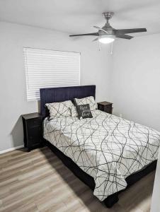 a bedroom with a bed and a ceiling fan at Central Scottsdale 2BR in a Quiet Area! in Scottsdale