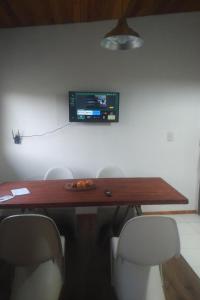 TV a/nebo společenská místnost v ubytování En Concordia, casa estilo industrial con amplio patio a 10 minutos de la plaza principal