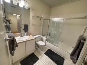 a bathroom with a sink toilet and a shower at 1 Bedroom & Office Near Caltrain and Stanford in Palo Alto +4 photos