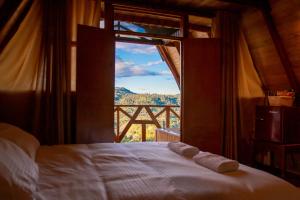 Llit o llits en una habitació de Antahkarana Casa Hotel