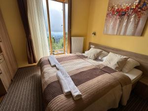 Letto o letti in una camera di Hotel Zarja