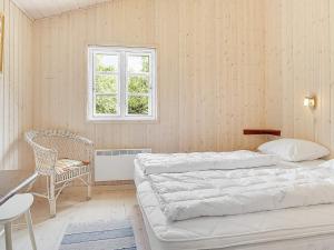 Katil atau katil-katil dalam bilik di Holiday home Jerup VI