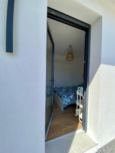 Postel nebo postele na pokoji v ubytování Chambre Privée Accès Piscine
