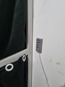 a electrical outlet on the side of a wall at alojamentohostel in Primavera do Leste
