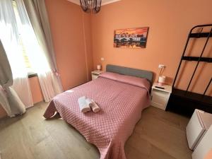 Postel nebo postele na pokoji v ubytování Affittacamere L'Aurora