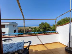 a balcony with a view of the ocean at Appartamento in Residence Mareblu in Nocera Terinese