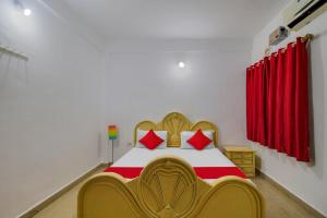 Postel nebo postele na pokoji v ubytování Hotel O K S Inn Hotel