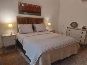 Кровать или кровати в номере Bonpland departamentos