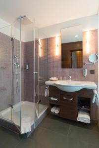 Koupelna v ubytování Corbin München Airport Business Hotel