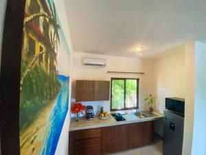 Kuchyň nebo kuchyňský kout v ubytování Basic Tulum