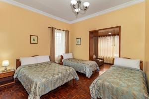 Postel nebo postele na pokoji v ubytování Hotel La Cartuja