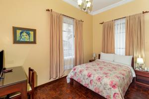 Postel nebo postele na pokoji v ubytování Hotel La Cartuja
