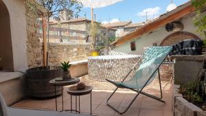 Balkón alebo terasa v ubytovaní Maison avec Jacuzzi et terrasse sur les toits