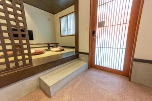 彩ホテル 橙にあるベッド