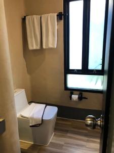 Koupelna v ubytování Punnpreeda Beach Resort - SHA Plus Certified