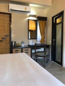 Postel nebo postele na pokoji v ubytování Punnpreeda Beach Resort - SHA Plus Certified