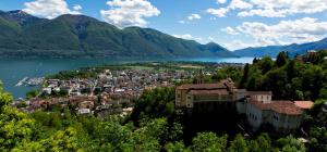 a view of a town next to a lake at Dolcevita Locarno in Locarno