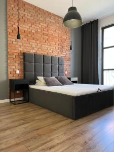 Postel nebo postele na pokoji v ubytování Apartament Świdnicka 49