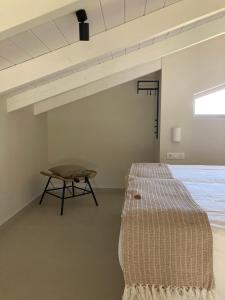Postel nebo postele na pokoji v ubytování Pnoe Eco Residences