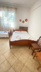 Postel nebo postele na pokoji v ubytování Besart room