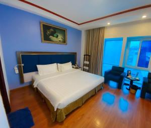 Ένα ή περισσότερα κρεβάτια σε δωμάτιο στο A25 Hotel - 61 Lương Ngọc Quyến
