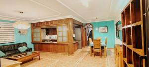 a living room with a couch and a table at Villa Verde Mar in Tinajo