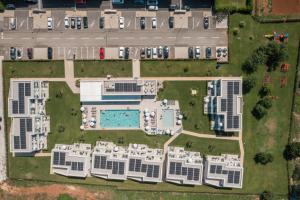 an aerial view of a building with a pool at Maj Luxury Residence in Poreč