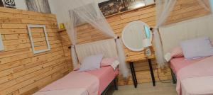 Postel nebo postele na pokoji v ubytování Villa Yandre Garden House - Ayamonte