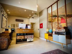 a room with a store with a display of items in it at Hotel Cristina in Lido di Jesolo