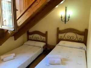 Posteľ alebo postele v izbe v ubytovaní Casa Valentí