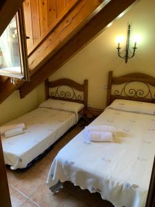 Posteľ alebo postele v izbe v ubytovaní Casa Valentí
