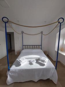 Postel nebo postele na pokoji v ubytování Palazzo Accinni B&B