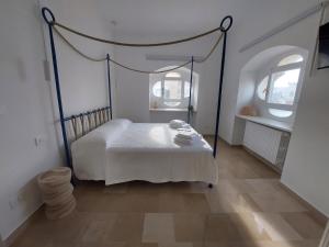 Postel nebo postele na pokoji v ubytování Palazzo Accinni B&B