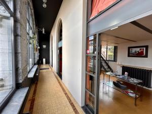 an internal view of a building with a hallway at B&B Tolkantoor in Zelzate