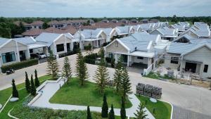 an aerial view of a row of houses at AKIRA Villa in Buriram