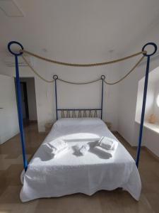 Postel nebo postele na pokoji v ubytování Palazzo Accinni B&B