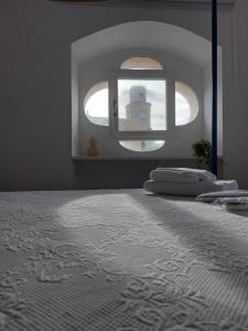Postel nebo postele na pokoji v ubytování Palazzo Accinni B&B