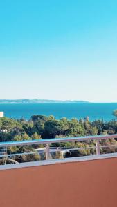 a view of the ocean from a balcony at Durres Apartment Panoramic Sea in Durrës