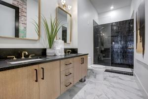 a bathroom with a sink and a toilet at Loft condo w parking & patio Apt 101 in Atlanta