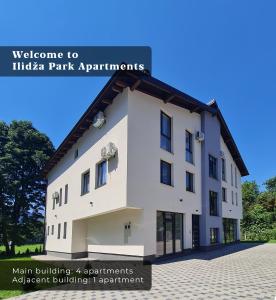 a building with the words welcome to tida park apartments at Ilidža Park Apartments in Sarajevo