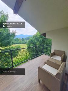 a balcony with a view of the mountains at Ilidža Park Apartments in Sarajevo