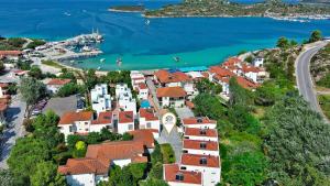 an aerial view of a town next to the water at Acrotel Porto Brava Luxury Villas in Ormos Panagias